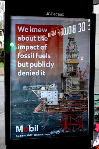 Illustration for article titled Paris Is Covered In Fake Ads That Mock the Climate Talks' Corporate Sponsors